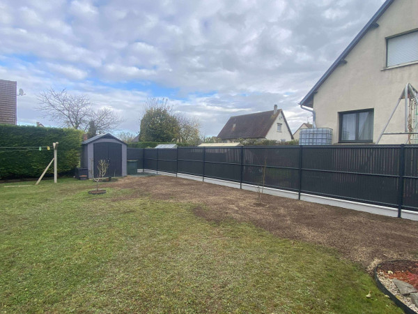 Pose de clôture et aménagement de jardin à Sannerville